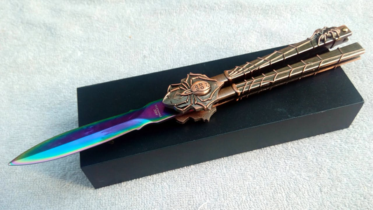 expensive butterfly knife trainer top angled view